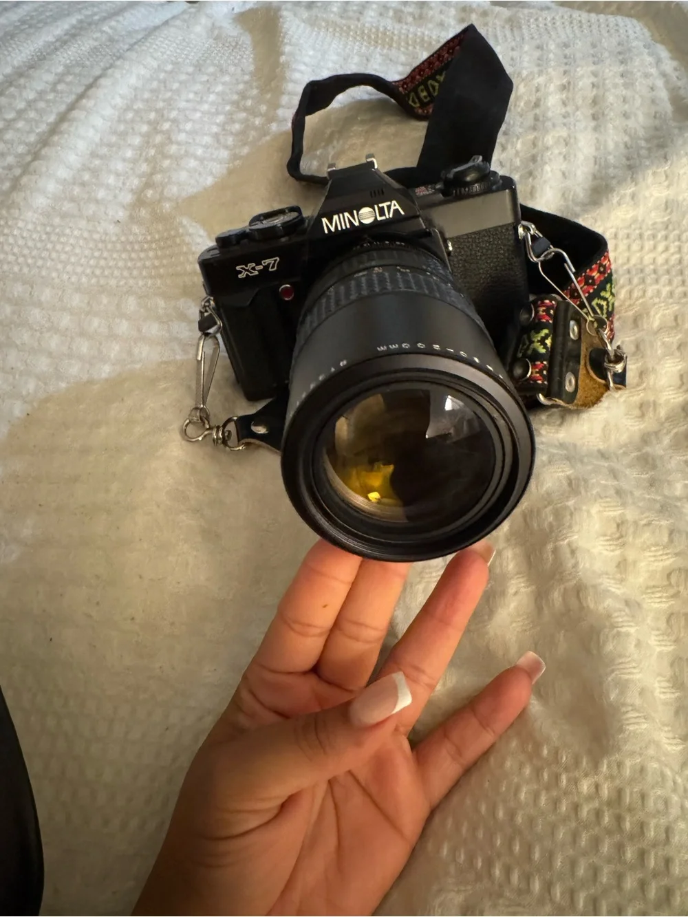 X-7 Minolta Black SLR Camera with Telephoto Lens